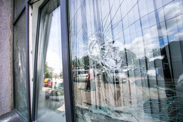 storefront-damage-repair-broken-glass-door-curtain-wall